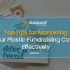 A stack of colorful fundraising cards from Duracard with a floral design and "refer a friend" text, representing effective marketing strategies.